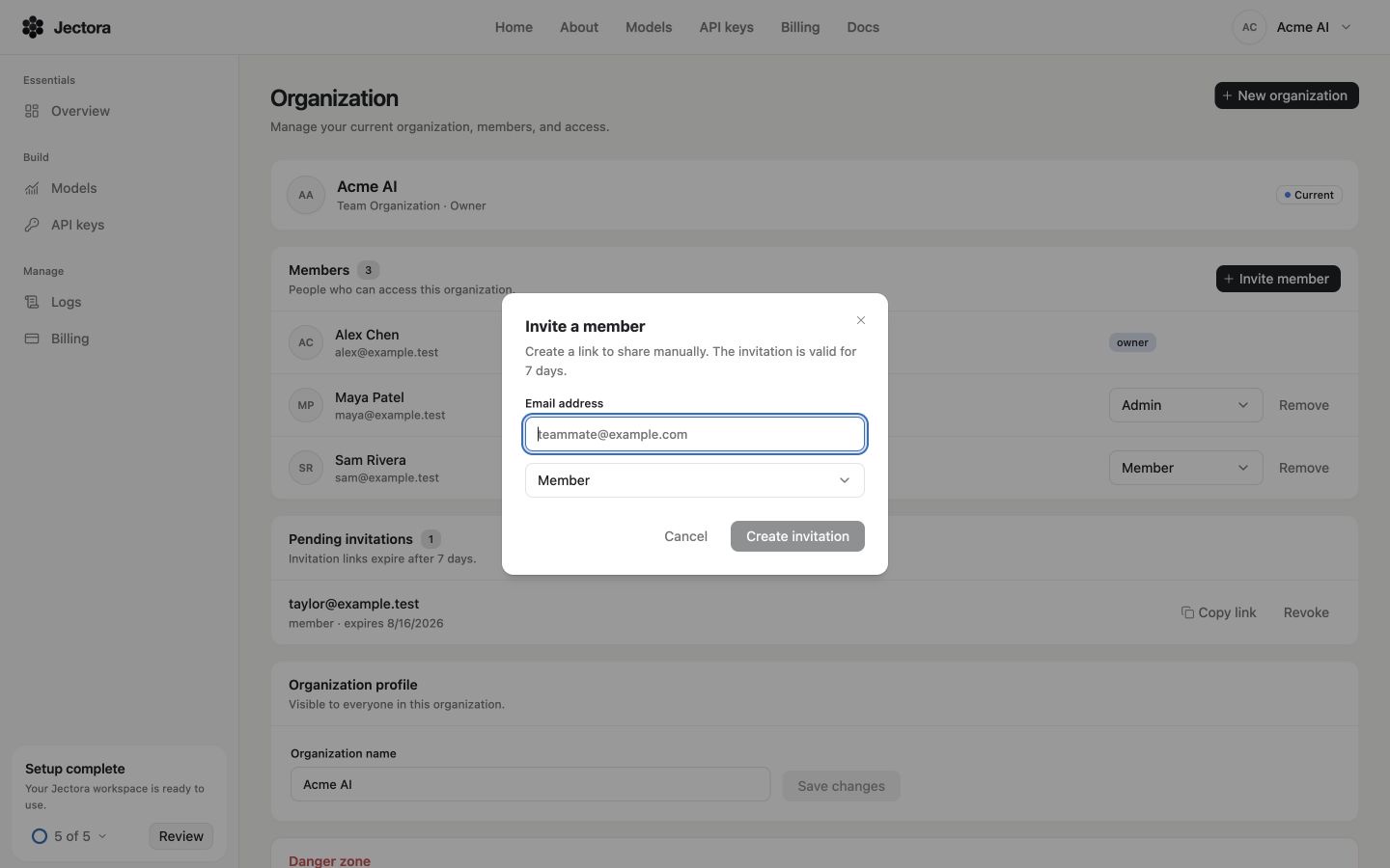 Invite a member dialog with email address and organization role fields